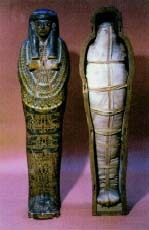 An Egyptian mummy dating from about 1000 B.C., that shows the outer decoration of the coffin and wrapped body inside. The Bridgeman Art Library